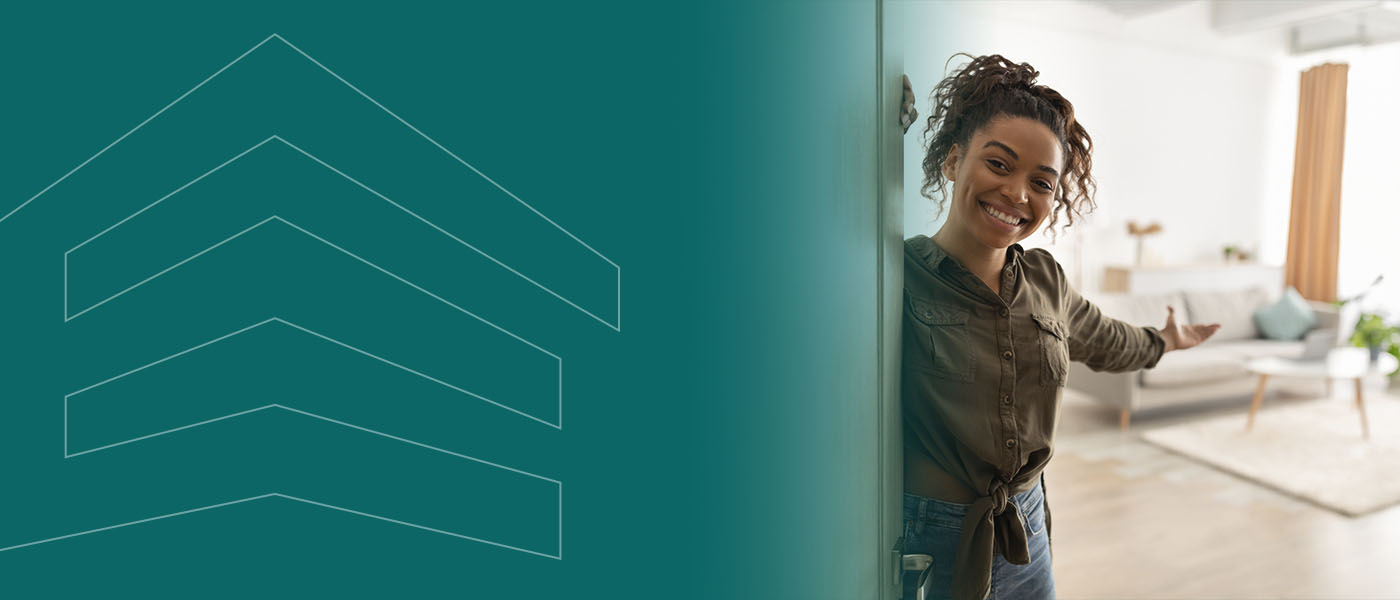 Woman opening the door to her apartment